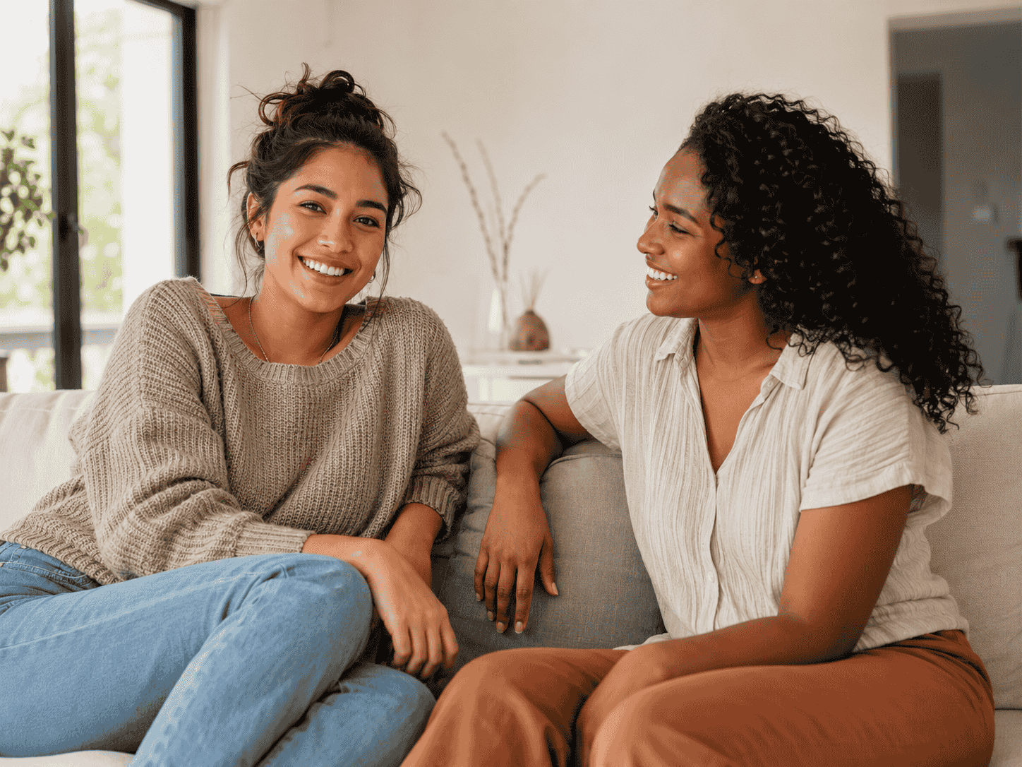 Teeth Whitening Cost in Southern California: What to Expect 5 woman smiling on couch