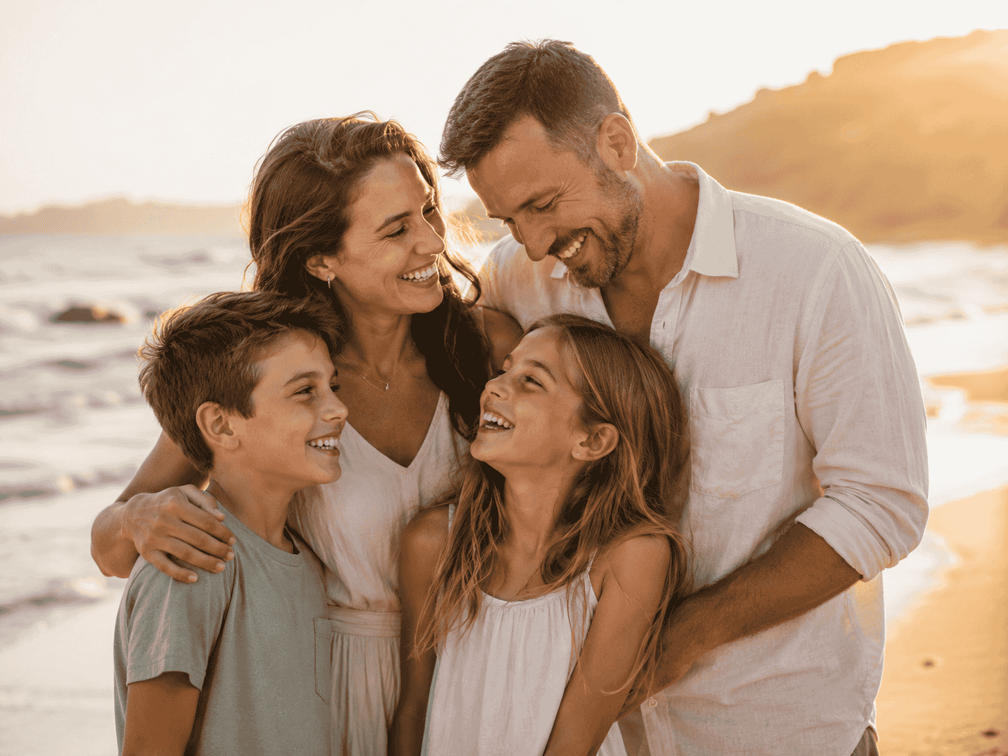 Sore-Free Smiles: How Laser Therapy Makes Dentures More Comfortable 5 family smiling together at the beach