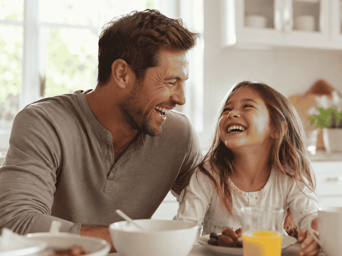 What Does a Healthy Tongue Look Like? Signs to Know 5 dad and daughter laughing at breakfast